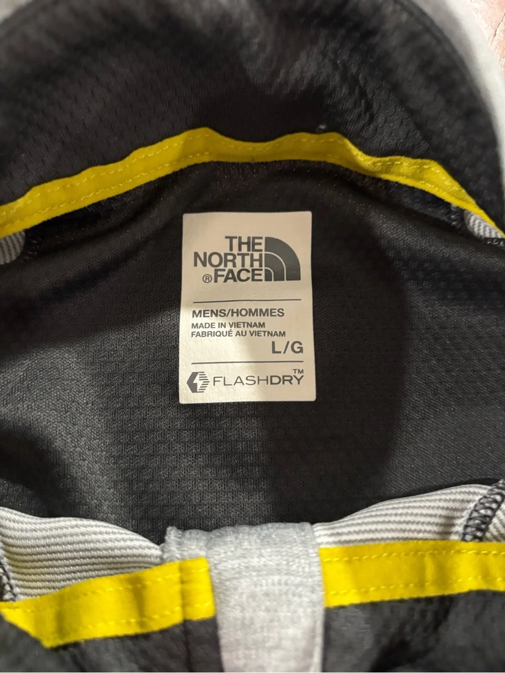 The North Face Men's Gray Quarter-Zip Performance Pullover with Yellow Chest Zip